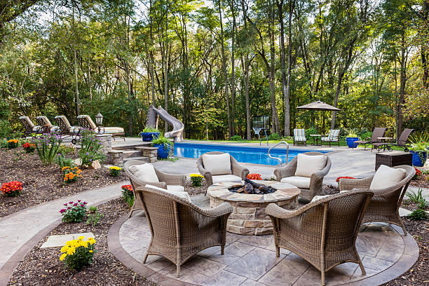 Patio Fire Pit by Swimming Pool stock photo