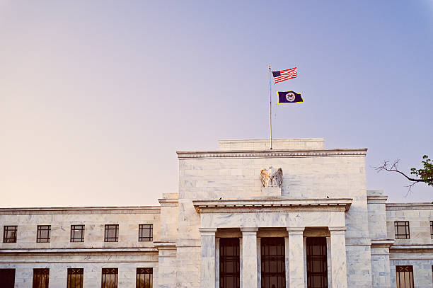 istock Federal Reserve building at sunset with US flag on top 155377314