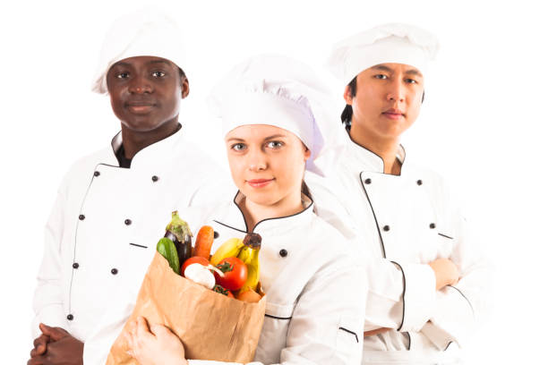 istock multi-ethnic group of cooks holding groceries 155377485