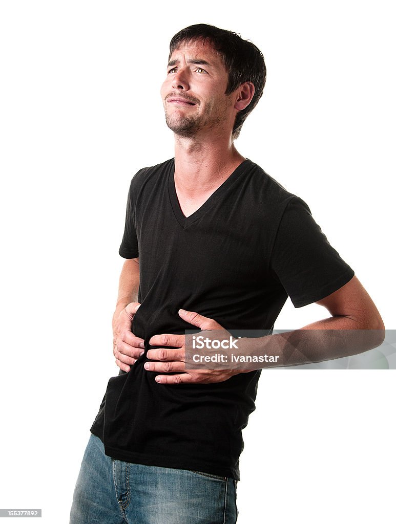 Jeune homme avec Maux d'estomac dans la douleur - Photo de Humour libre de droits