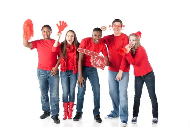 Photo of Sports Fans: Group Teenagers Cheering Together Winning Team Red