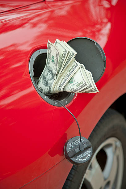istock Hundreds into the gas tank - analogy 155378080