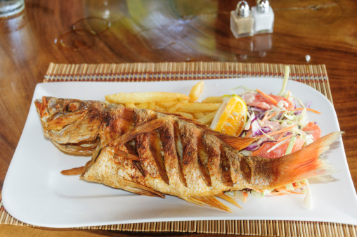 Whole fried red snapper is a typical Costa Rican meal. Guanacaste, Costa Rica