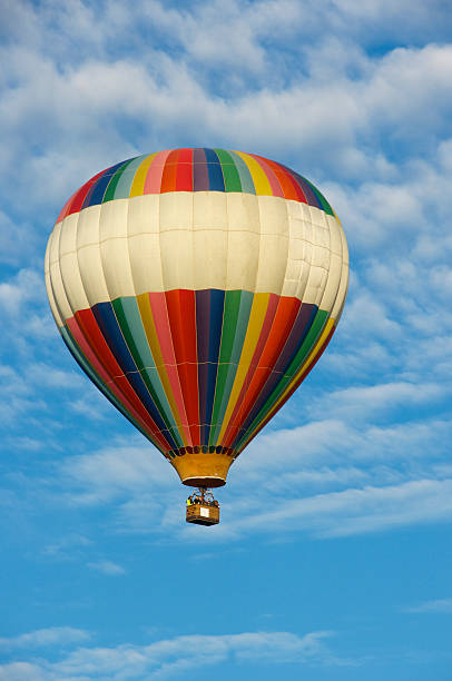 Hot air balloon against a blue sky.