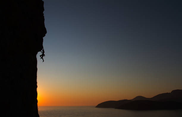 istock Woman rockclimbing 155378337