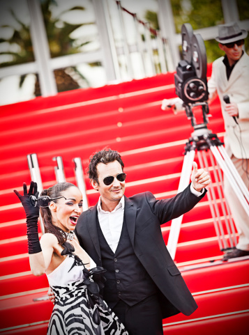 Celebrity couple on red carpet in Cannes. Taken on event iStockalypse Cannes 2010.