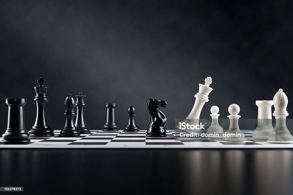 Checkmate move, Chess Knight is checking Chess King, chess board Checkmate move, Chess Knight is checking Chess King on chess board. Chess Stock Photo