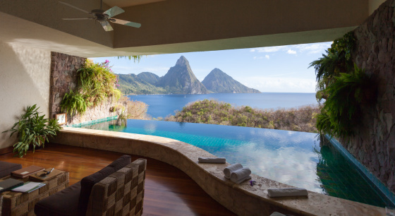 The World Heritage Petit Piton framed by  beautiful infinity-pool. View from the famous resort Jade Mountain.