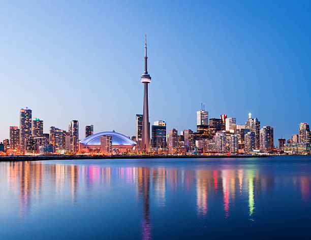 Toronto City Skyline at Night in Canada Toronto city skyline at twilight, Canada. toronto photos stock pictures, royalty-free photos & images