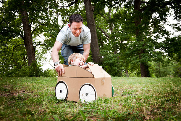 istock Little Boy in a Cardboard Car 155378905