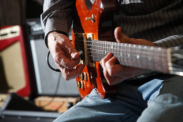 Guitar Playing Detail stock photo