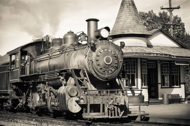 istock Vintage Steam Engine At Historic Train Station Platform 155379164