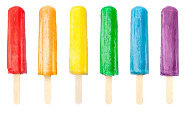 Popsicles in six different colors isolated on a white background.
