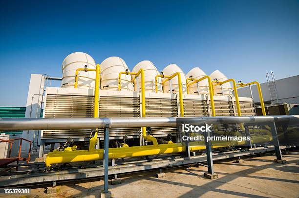 Sets Of Cooling Towers In Conditioning Systems Stock Photo - Download Image Now - Cooling Tower, Air Conditioner, Business