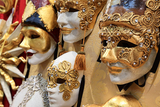 Venetian masks for sale at a stall in Piazza San Marco during the carnival festival
