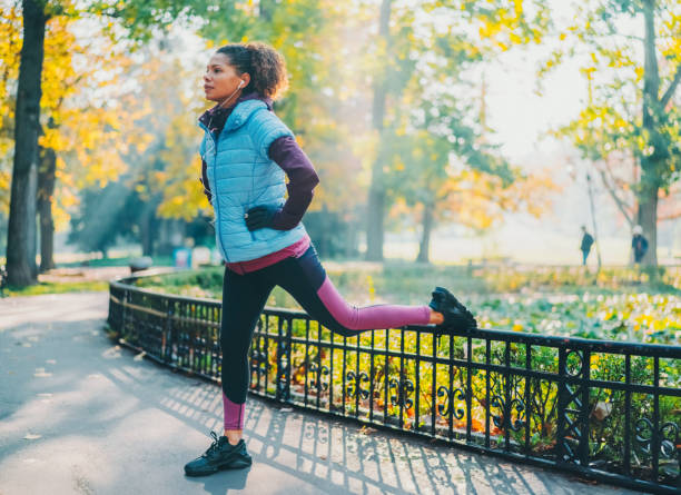 istock Sportswoman exercising Bulgarian split squat 1553801541