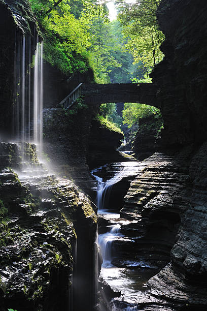 Rainbow Falls in Watkins Glen State Park Rainbow Falls and water cascade in Watkins Glen State Park in the Finger Lakes region of New York, USA watkins glen stock pictures, royalty-free photos & images