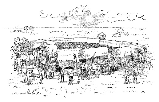 A wagon train circled into a wagon corral/fort formation in New Mexico, USA. Vintage etching circa 19th century.