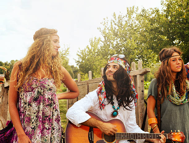 istock Group of Hippie Singing in Countryside 155380618