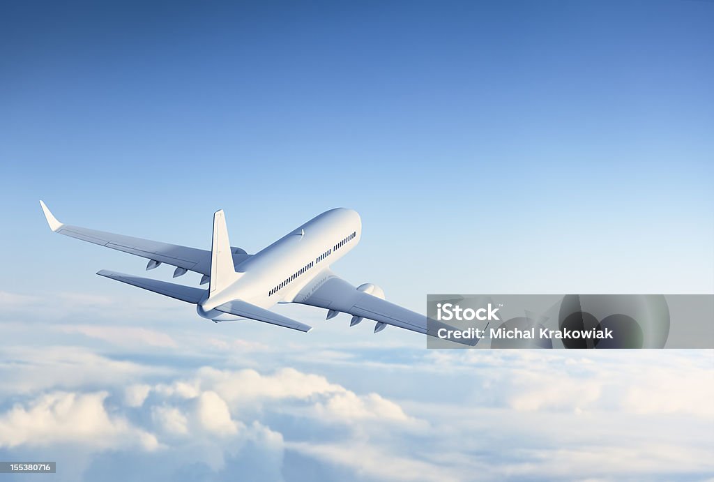 Commerciale avion voler au-dessus des nuages - Photo de Avion libre de droits