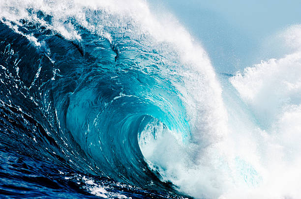 Close-up view of huge ocean waves Raw ocean power, up close. tsunami wave stock pictures, royalty-free photos & images