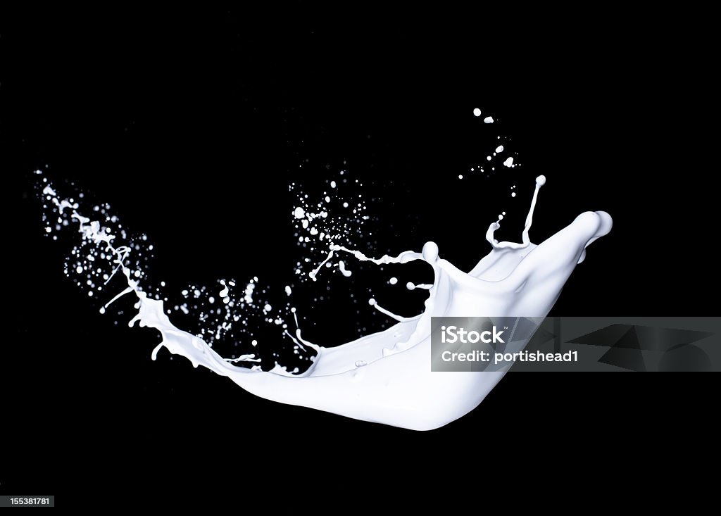 white paint splash white paint splash on black background Splashing Stock Photo