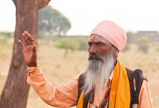 istock Holy indian man holding up his hand in blessing 155381800