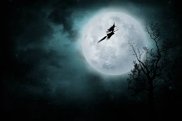 Night flight. Witch riding a broom.