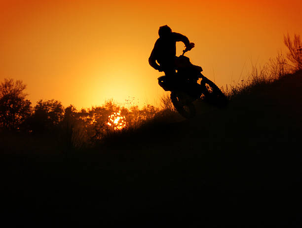 istock Motocross rider at sunset 155382145
