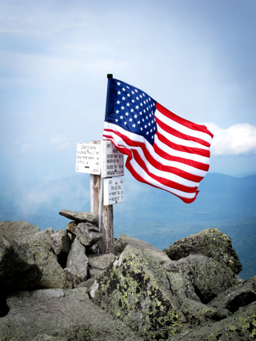 American flag being flown on the summit of Mt. Adams (5774'), Sept 8th, 2012, as part of the \