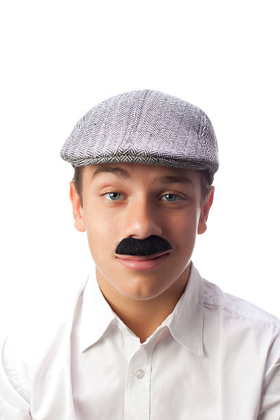 Young Italian Boy Winking with Mustaches and Coppola stock photo