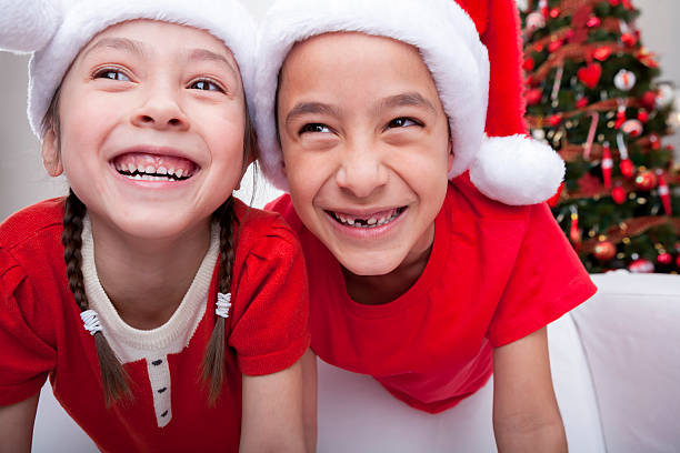 istock Young boy and girl playing during Christmas break 155382454