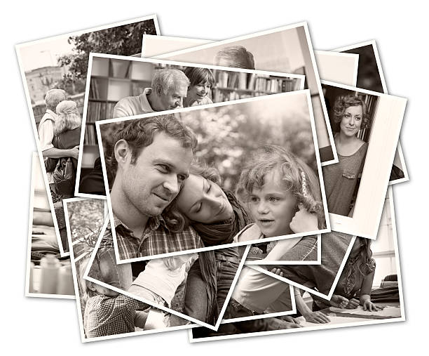 stack of b&w, toned images - family photographs - on white background with drop shadow. 