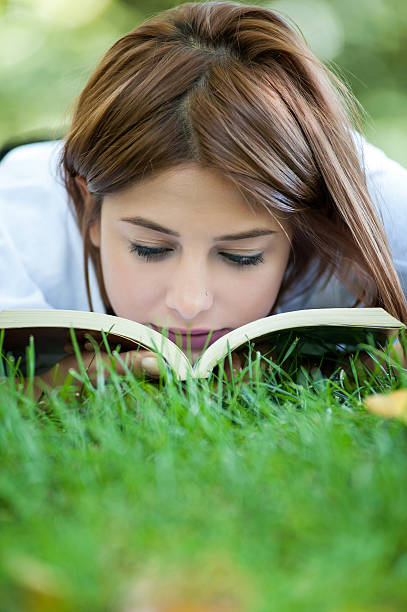 istock The girl lying on a grass 155383382