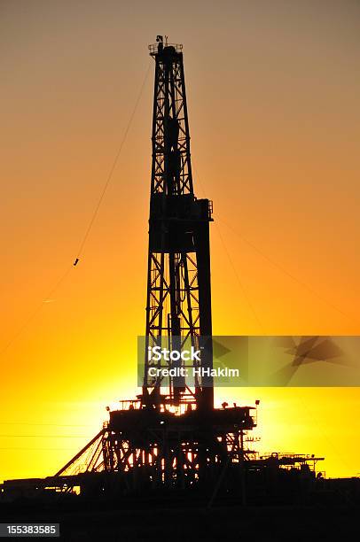 Drilling Rig Silhouette Stock Photo - Download Image Now - Back Lit, Color Image, Dawn