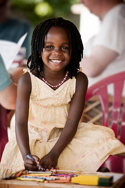 istock Cute african girl drawing 155383980
