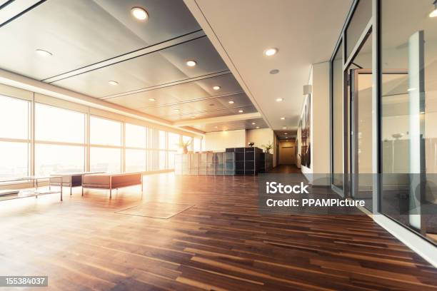 Office Reception With Wood Floors And Window Wall Stock Photo - Download Image Now - Office, Business, Lighting Equipment