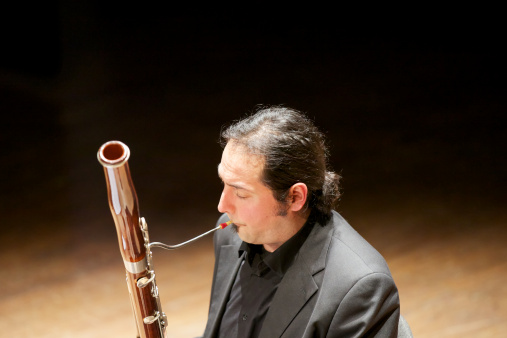 Bassoonist in a italian classical theatre during a concert http://www.massimomerlini.it/is/music.jpg http://www.massimomerlini.it/is/lifestyles.jpg