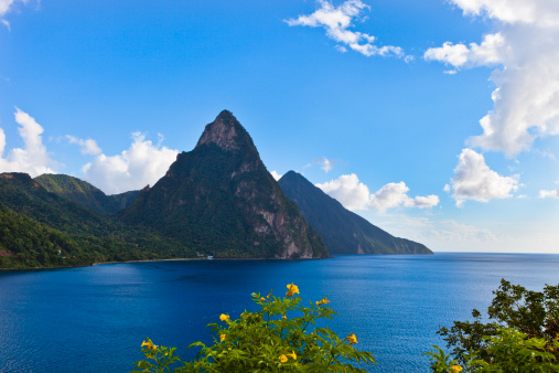 The Pitons are undoubtedly the best known natural landmark of Saint Lucia. These two twin volcanic plugs, the Gros Piton and Petit Piton, 770 and 743 meters high, respectively, are included in UNESCO World Heritage Site since 2004. They are just south of the town of Soufriere. Canon EOS 5D Mark II