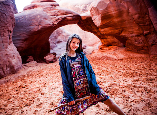 istock Cute Girl at Sand Dune Arch in Moab Utah 155384490