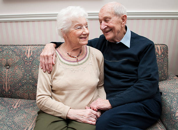 istock Senior couple at home sharing a happy moment 155384548