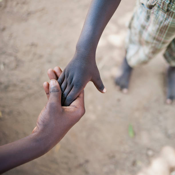 istock Hands of African Children 155384667