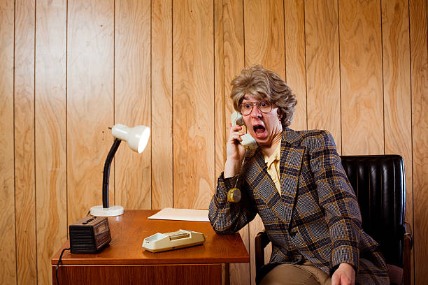 istock Shocked Retro Businessman On The Phone 155384734