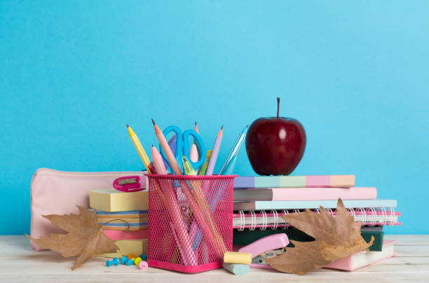 istock Composition with books and stationery on wooden table. Back to school concept 1553852852
