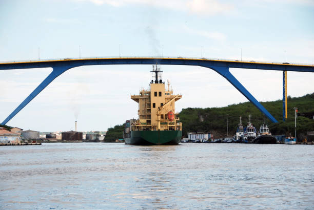 istock Container ship and the Queen Juliana Bridge 155385317