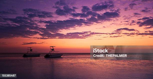 Sport Fishing Motor Boats At Sunset Stock Photo - Download Image Now - Anchored, Caribbean Sea, Coastline