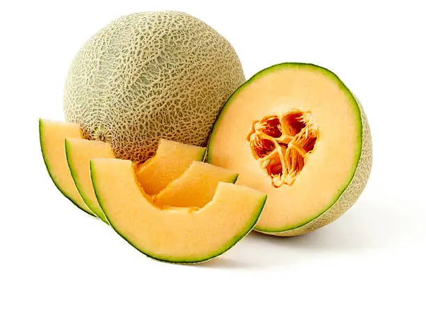 Sliced cantaloupe with whole cantaloupe isolated on white background, larger files include clipping path.  Exported 16 bit depth, color corrected and retouched for maximum image quality.