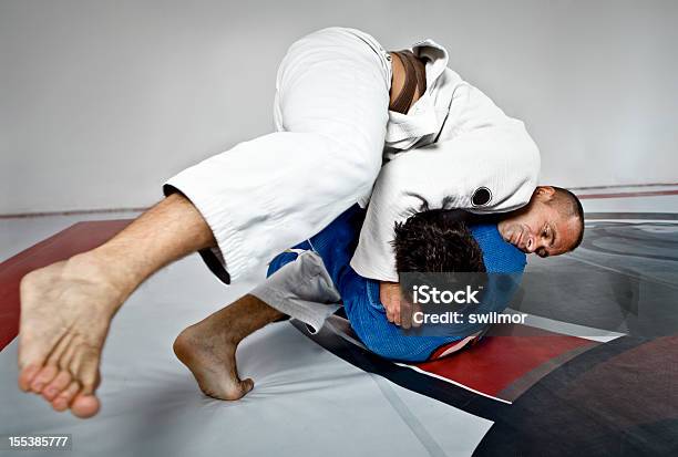 Two Men In Jiujitsu Training Stock Photo - Download Image Now - Jujitsu, Brazilian Jiu-Jitsu, Photography