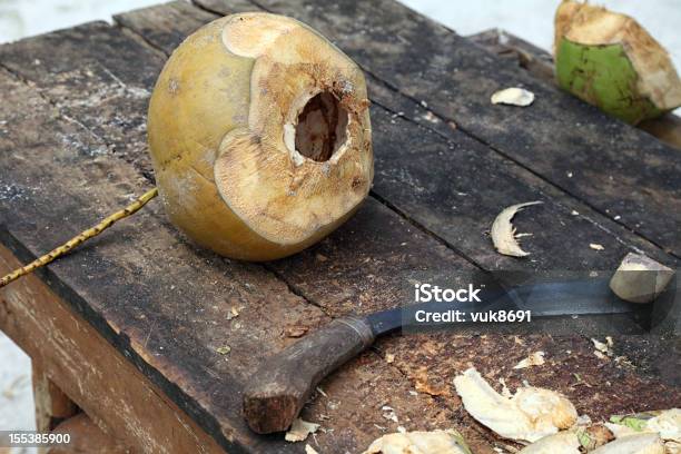 Table With Coconut And A Knife For Cutting Stock Photo - Download Image Now - Asia, Blade, Brown