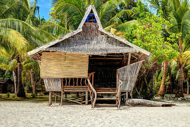 Traditional Philippine house Traditional house on the island of Coron, Philippines, hdr beach hut stock pictures, royalty-free photos & images